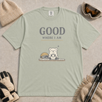 Bay tee featuring a small polar bear holding a warm mug beside ski goggles, with the phrase “Good Where I Am.”