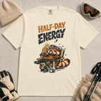 Ivory tee featuring a relaxed red panda lounging in a chair with snowboard gear and the phrase “Half-Day Energy.”