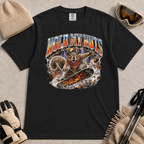 Black tee featuring a retro “Hold My Nuts” snowboarding squirrel graphic with flying acorns, lightning, and bold metallic lettering.