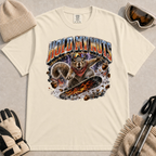 Ivory tee featuring a retro “Hold My Nuts” snowboarding squirrel graphic with flying acorns, lightning, and bold metallic lettering.