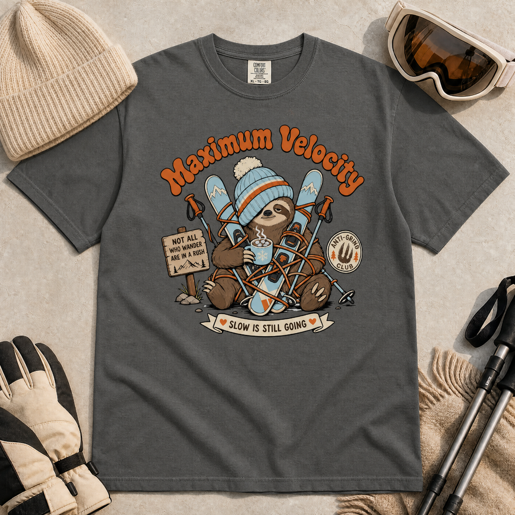 Pepper gray t-shirt with a sloth graphic and 'Maximum Velocity' text, surrounded by winter accessories on a beige background.