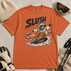 Yam orange colored t-shirt with a graphic of a raccoon snowboarding and 'Slush Season' text, surrounded by winter accessories.