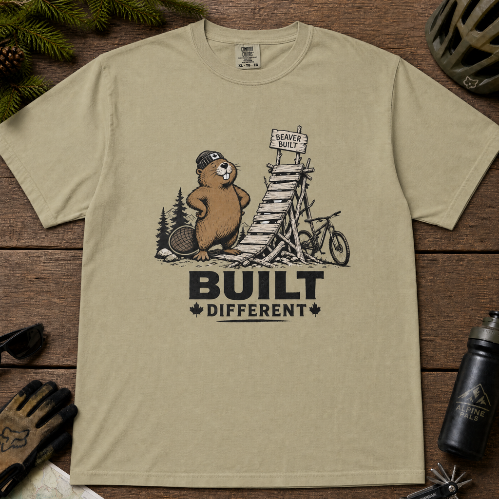 Khaki colored t-shirt with beaver graphic and 'Built Different' text.