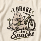 Ivory white t-shirt with a marmot graphic and text 'I Brake for Snacks'.