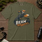 Hemp green t-shirt with a graphic of a fox riding a bike and ' Berm Whisperer'.