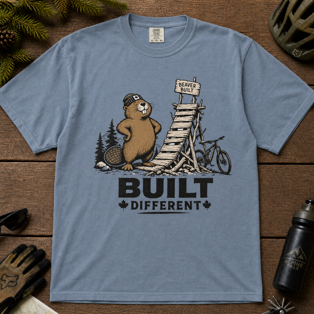 Blue jean colored t-shirt with a beaver graphic and 'Built Different' text.