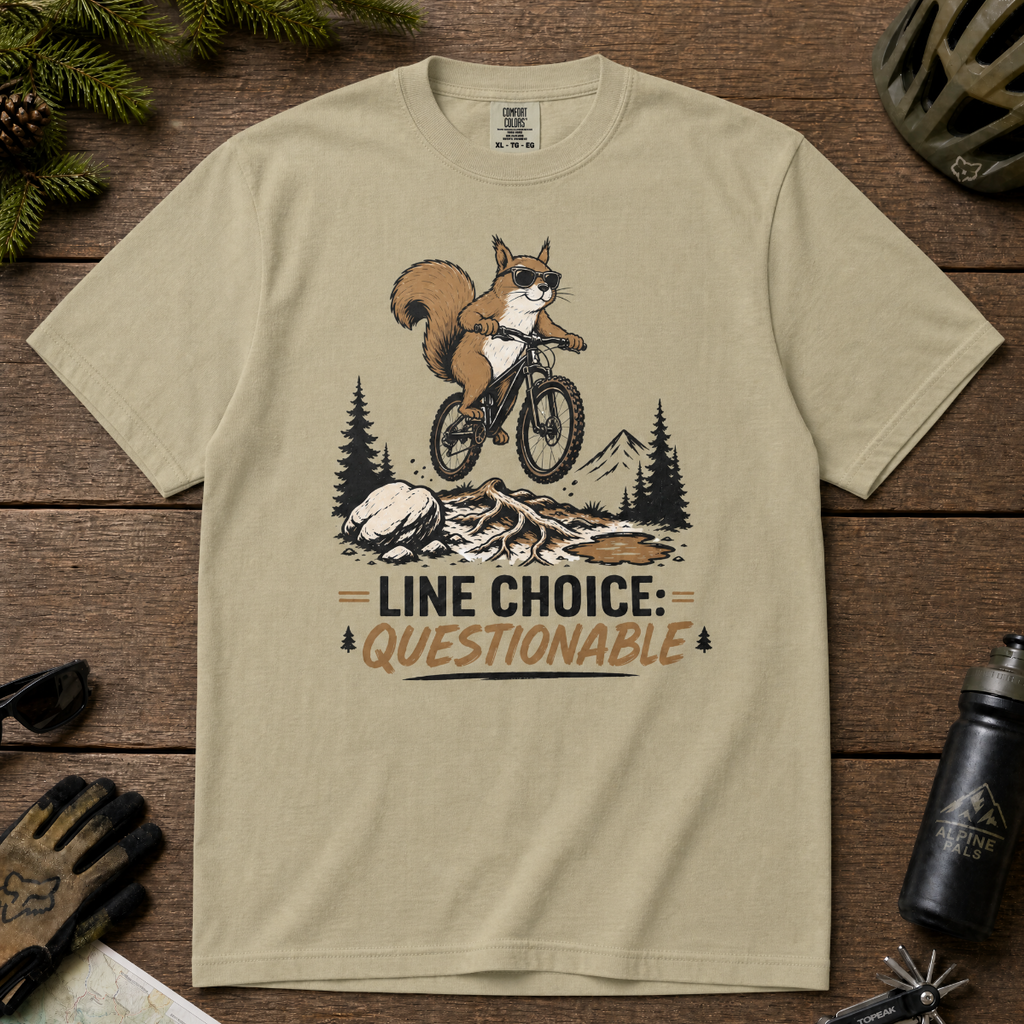 Khaki colored t-shirt with a graphic of a squirrel on a bike and text 'Line Choice: Questionable'.