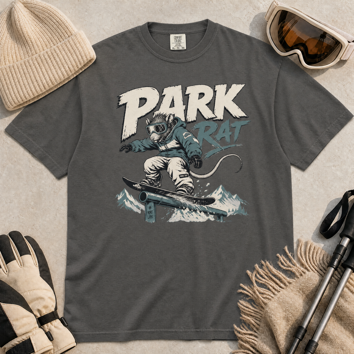 Pepper gray t-shirt with graphic of a rat snowboarding and 'Park Rat' text.