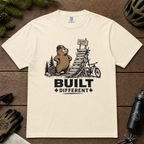 Ivory white t-shirt with beaver graphic and 'Built Different' text.