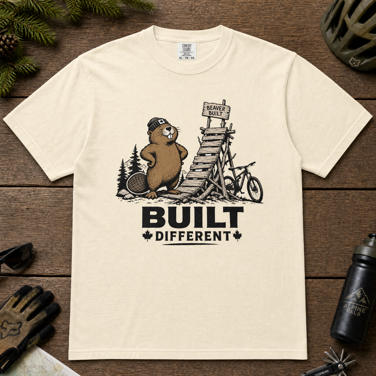 Ivory white t-shirt with beaver graphic and 'Built Different' text.