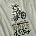 Bay green t-shirt with a graphic of a rabbit riding a bike and text 'HOPS COUNT AS AIR TIME'.