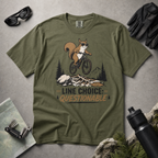 Hemp green t-shirt with a graphic of a squirrel on a bike and text 'Line Choice: Questionable'.