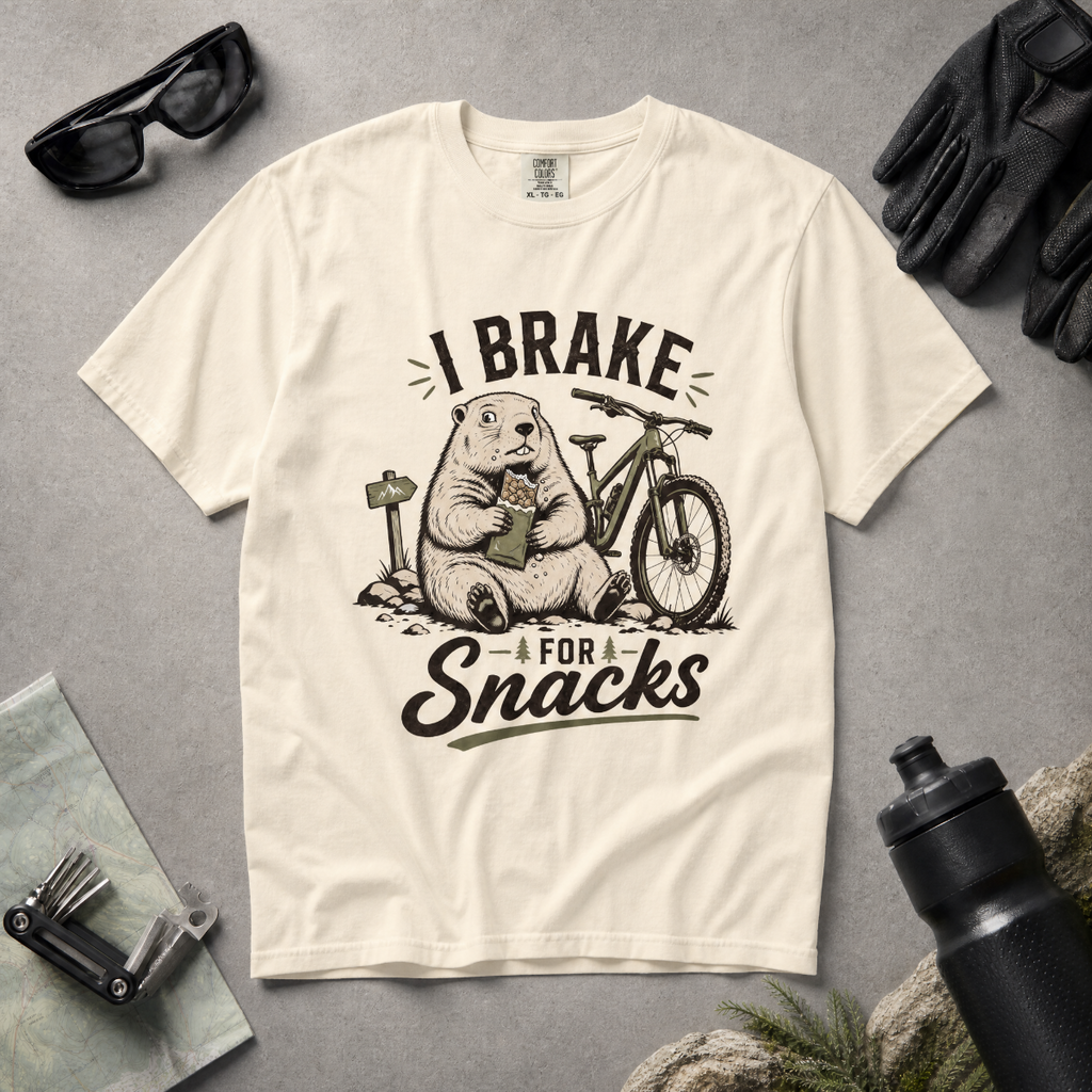 Ivory white colored t-shirt with 'I Brake For Snacks' text and a marmot eating a bar with a mountain bike on the side.