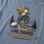 Blue jean t-shirt with a graphic of a squirrel on a bike and text 'Line Choice: Questionable'.