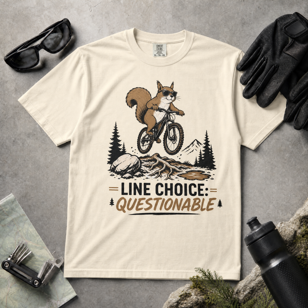 Ivory white t-shirt with a graphic of a squirrel on a bike and text 'Line Choice: Questionable'.