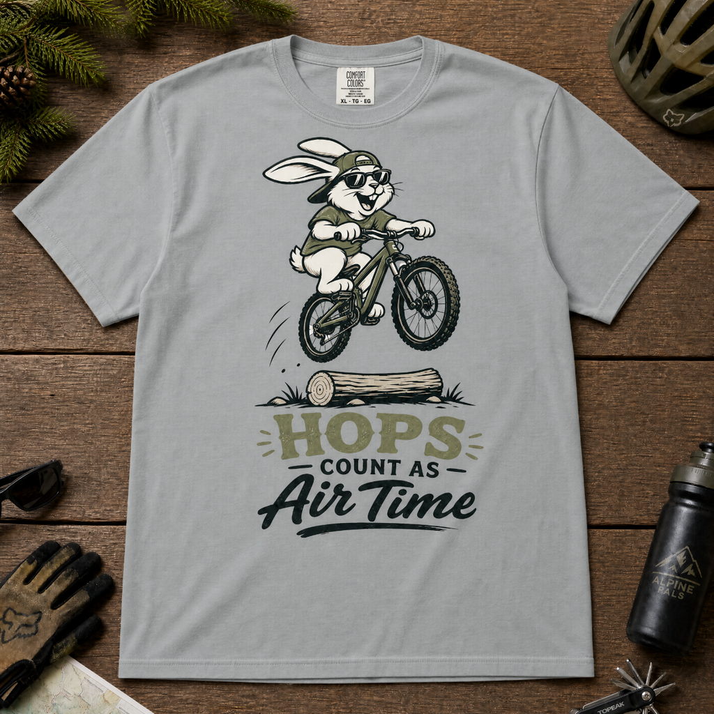 Granite gray t-shirt with a graphic of a rabbit riding a bike and text 'HOPS COUNT AS AIR TIME'.