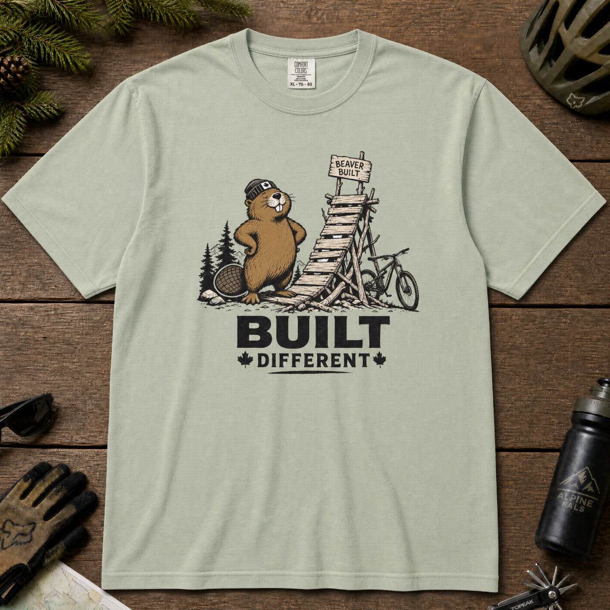 Bay green t-shirt with beaver graphic and 'Built Different' text.