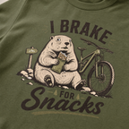 Hemp green t-shirt with 'I Brake For Snacks' text and a marmot eating a bar with a mountain bike on the side.