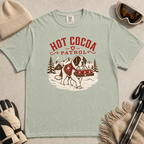 Bay green t-shirt with a graphic of a dog and 'Hot Cocoa Patrol' text.