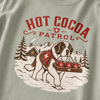 Bay green t-shirt with a graphic of a dog and 'Hot Cocoa Patrol' text.
