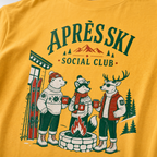 Mustard yellow t-shirt with 'Apres Ski Social Club' graphic.