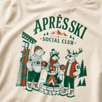 Ivory white t-shirt with 'Apres Ski Social Club' graphic.