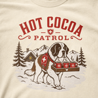 Ivory white t-shirt with a graphic of a dog and 'Hot Cocoa Patrol' text.