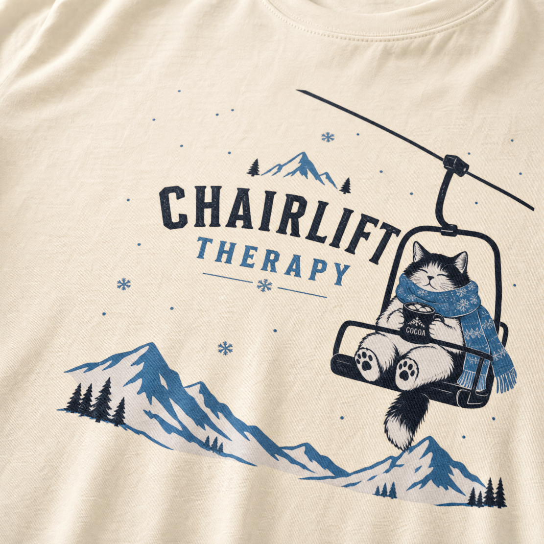 Ivory white t-shirt with 'Chairlift Therapy' graphic design.