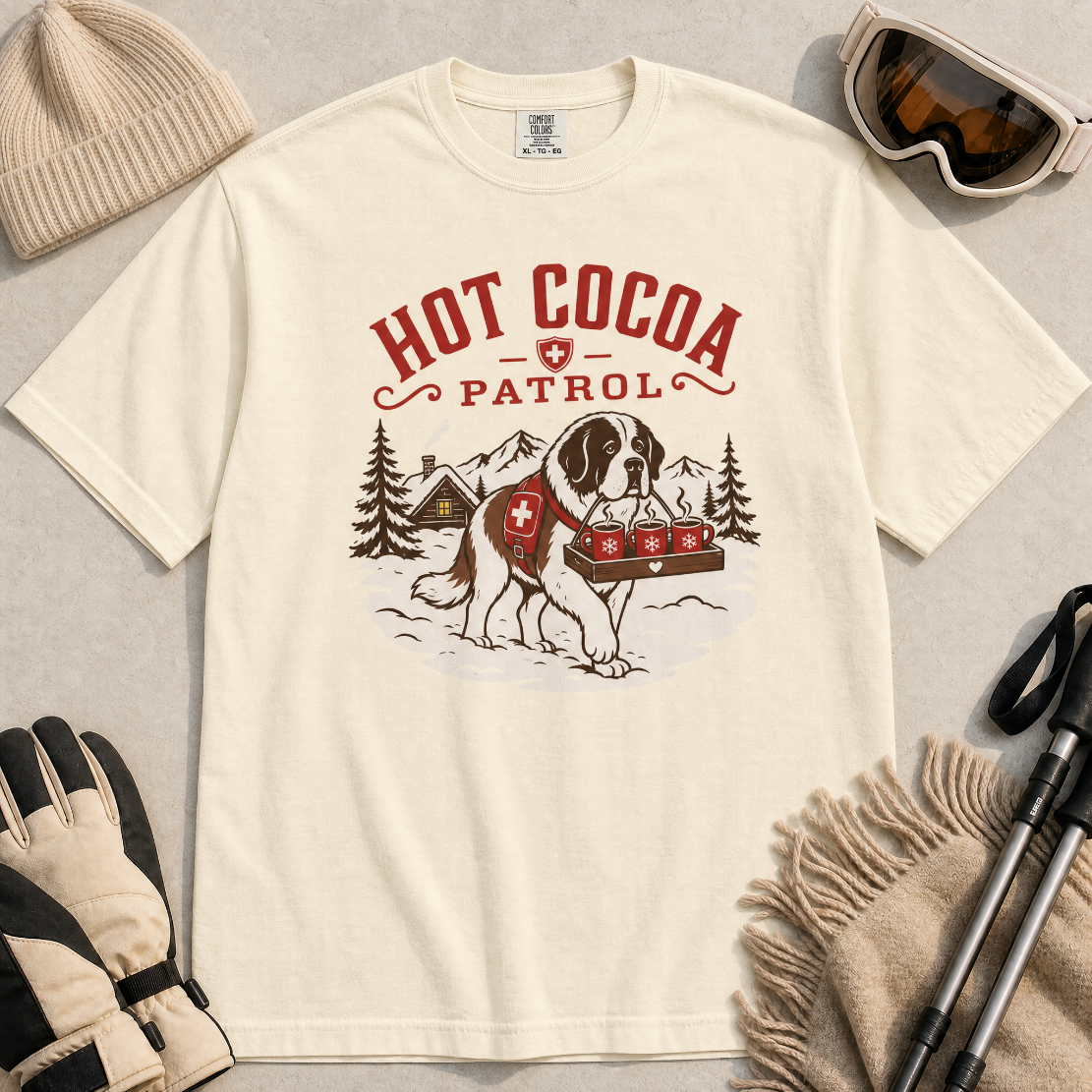 Ivory white t-shirt with a graphic of a dog and 'Hot Cocoa Patrol' text.