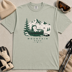 Bay green t-shirt with a graphic of a husky in a hot tub surrounded by mountains and trees.