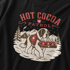 Black t-shirt with a graphic of a dog and 'Hot Cocoa Patrol' text.