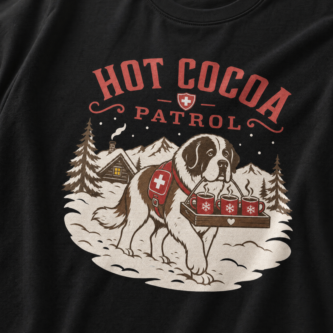 Black t-shirt with a graphic of a dog and 'Hot Cocoa Patrol' text.