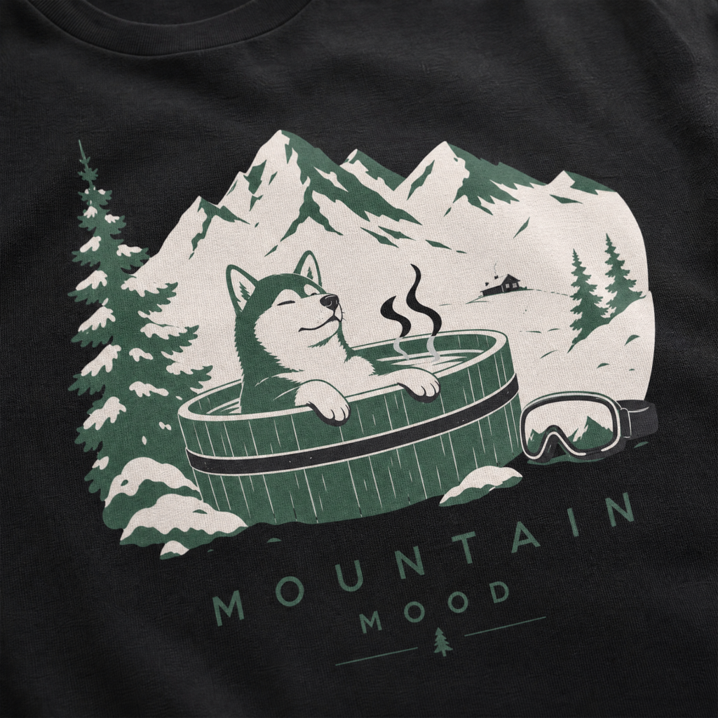 Black t-shirt with a graphic of a husky in a hot tub surrounded by mountains and trees.