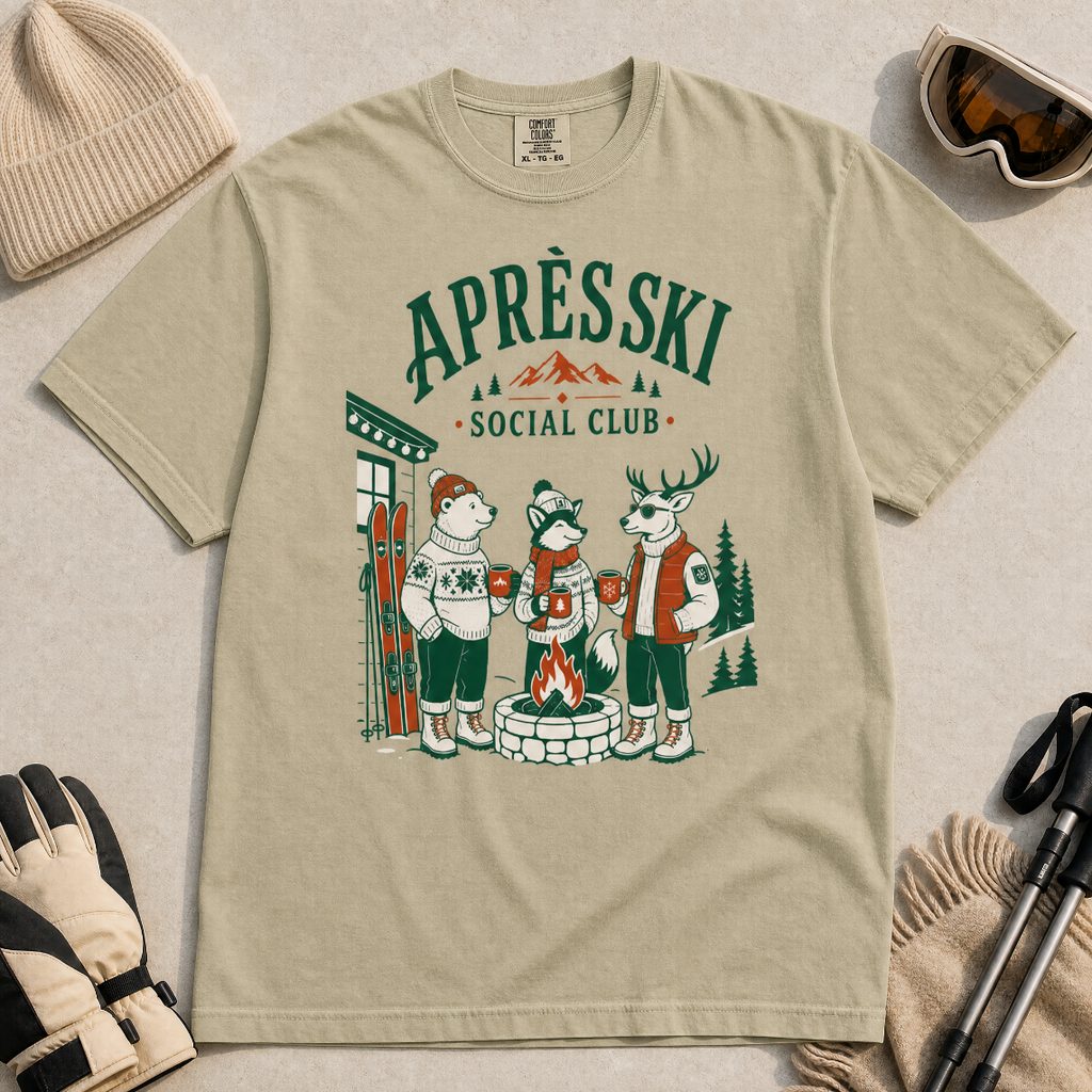 Khaki colored t-shirt with 'Apres Ski Social Club' graphic.