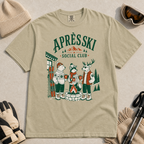 Khaki colored t-shirt with 'Apres Ski Social Club' graphic.