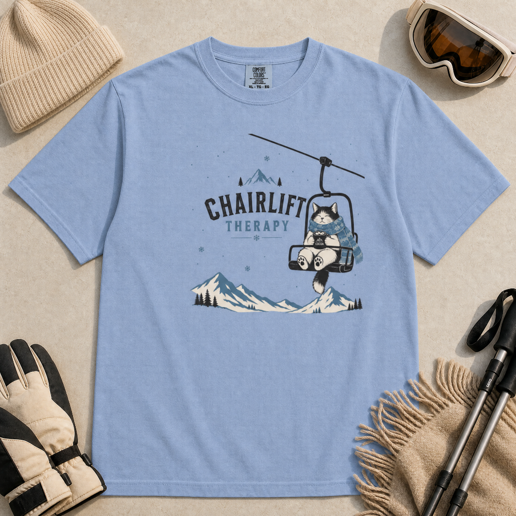 Washed denim blue t-shirt with 'Chairlift Therapy' graphic design.