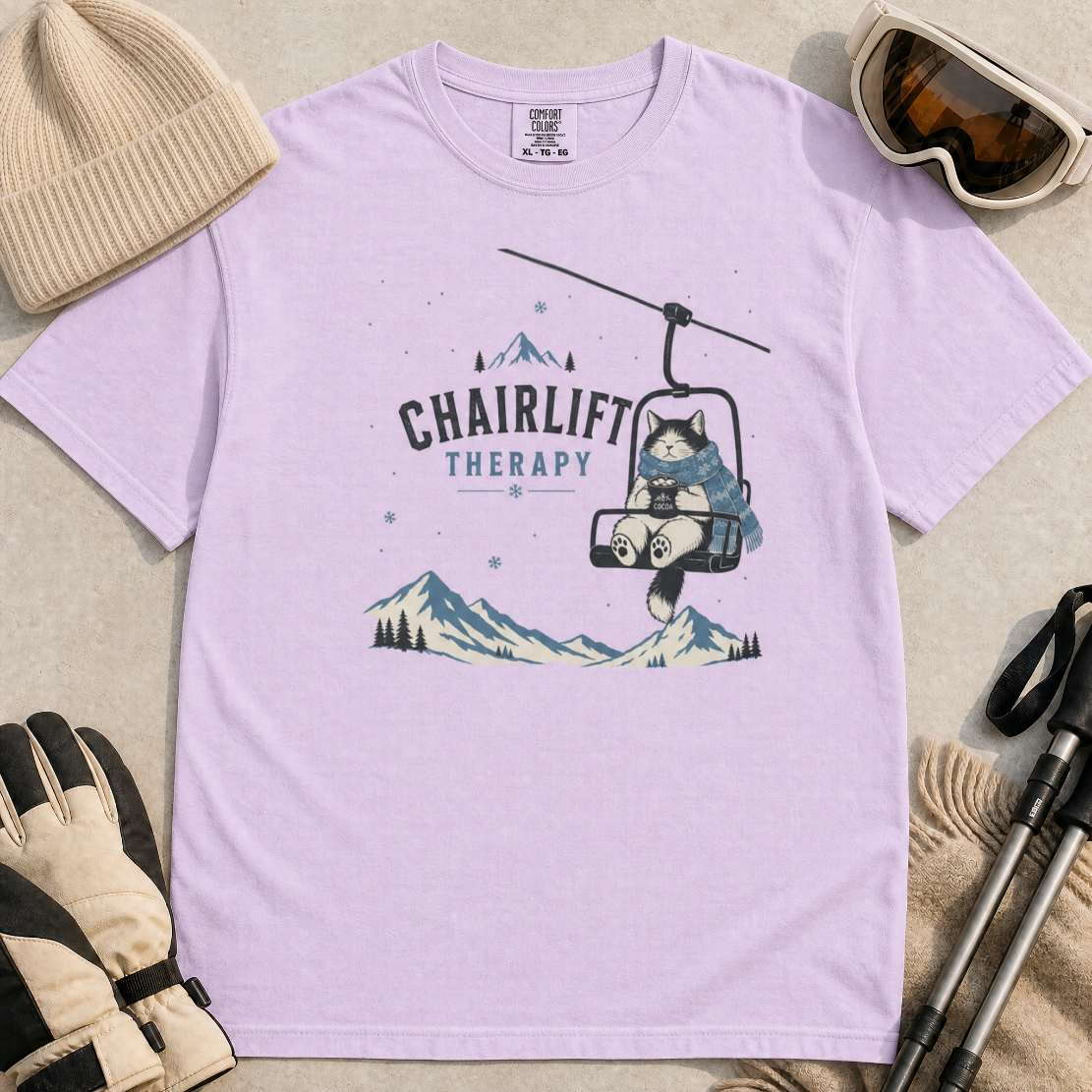 Orchid colored t-shirt with 'Chairlift Therapy' graphic design.
