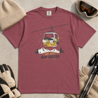 Brick red t-shirt with a graphic of a dog in a gondola lift and text 'Ski Fast Nap Faster'.