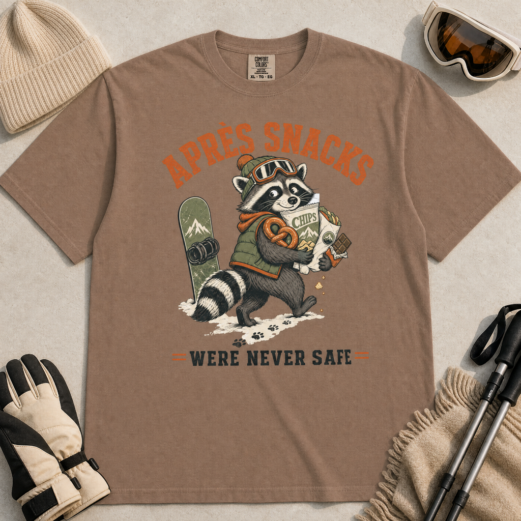 Espresso brown t-shirt with a raccoon stealing snacks graphic and "Après Snacks Were Never Safe" text.