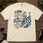 Ivory white t-shirt with graphic design and text on a wooden surface with outdoor gear.