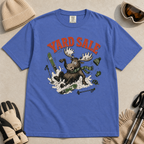 Mystic blue t-shirt with moose graphic and 'Yard Sale' text, surrounded by winter accessories on a light background