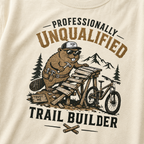 Beaver graphic on a t-shirt with text 'Professionally Unqualified Trail Builder'.
