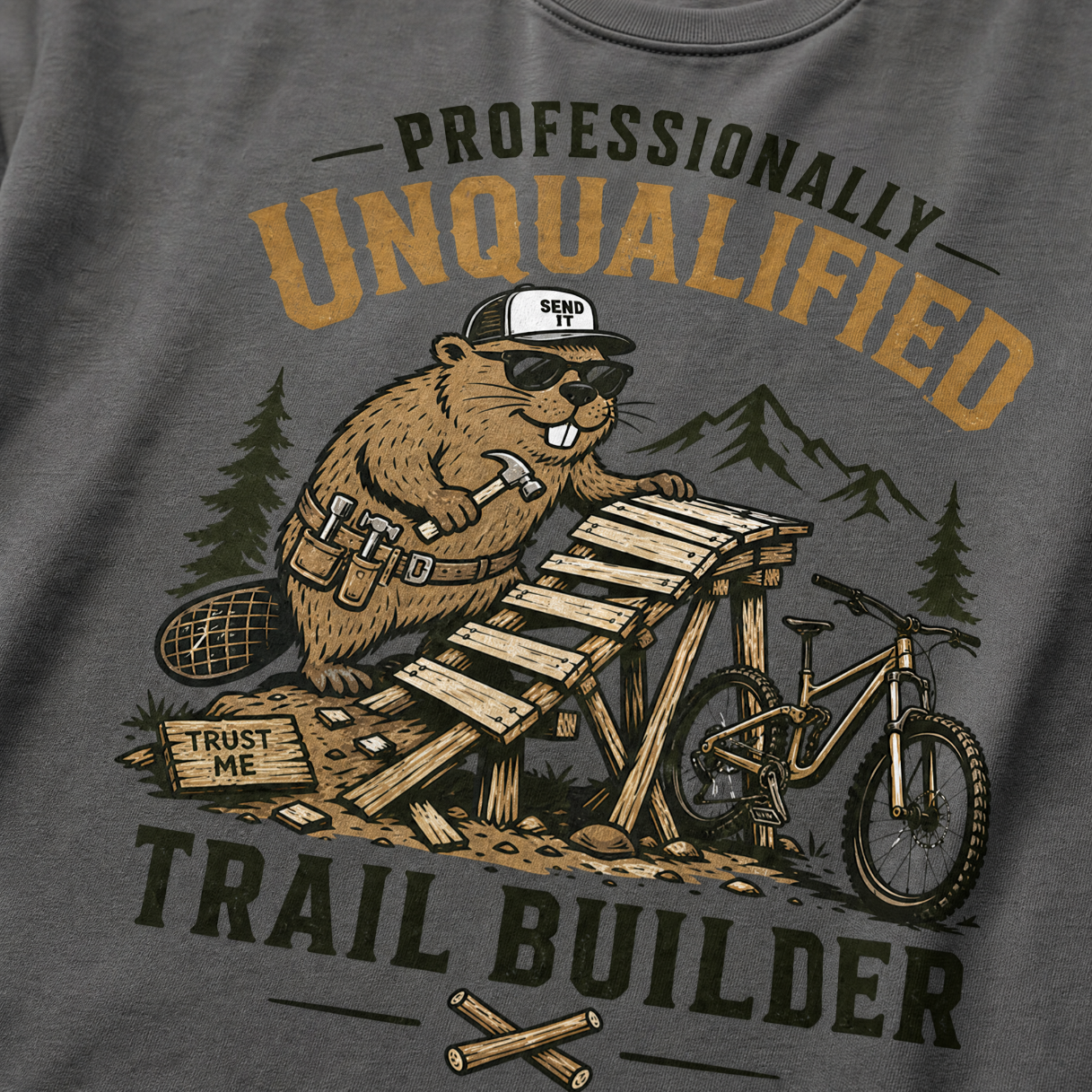 Pepper gray t-shirt with a beaver graphic and text 'Professionally Unqualified Trail Builder'.