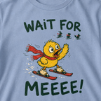 Close-up of a washed denim blue t-shirt showing a worried duck skier calling after three distant animals, with bold “Wait for Meeee!” text.