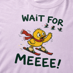 Close-up of an orchid t-shirt showing a worried duck skier calling after three distant animals, with bold “Wait for Meeee!” text.