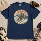 Navy blue t-shirt featuring a vintage ski bear carving through powder beneath “Full Send Forest Club” and “Ski the Wild Side” text.