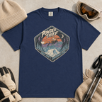 Navy blue t-shirt featuring a distressed retro fox snowboarder jumping over a snowy mountain beneath “Powder Thief” lettering.