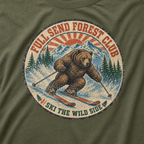 Close-up of a distressed vintage-style bear skiing through snowy mountains with “Full Send Forest Club” and “Ski the Wild Side” lettering.