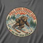Close-up of a distressed vintage-style bear skiing through snowy mountains with “Full Send Forest Club” and “Ski the Wild Side” lettering.