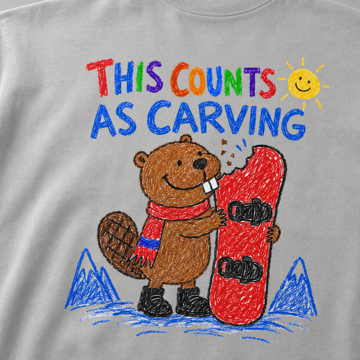 Close-up of a granite gray t-shirt featuring a childlike crayon-style beaver biting a red snowboard, with colourful “This Counts as Carving” text.